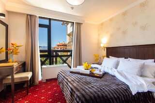Отель Premier Luxury Mountain Resort Банско Семейный люкс с балконом-1